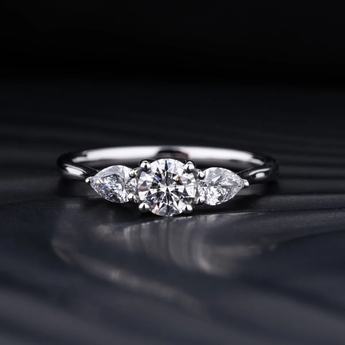 Round Diamond Ring With Pear Side Stones | Earthly Jewels