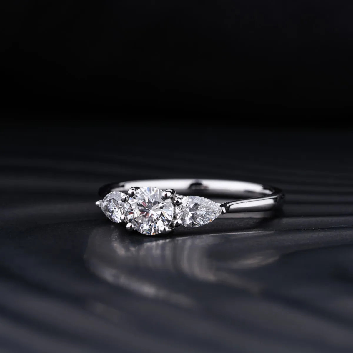 Round Diamond Ring With Pear Side Stones | Earthly Jewels