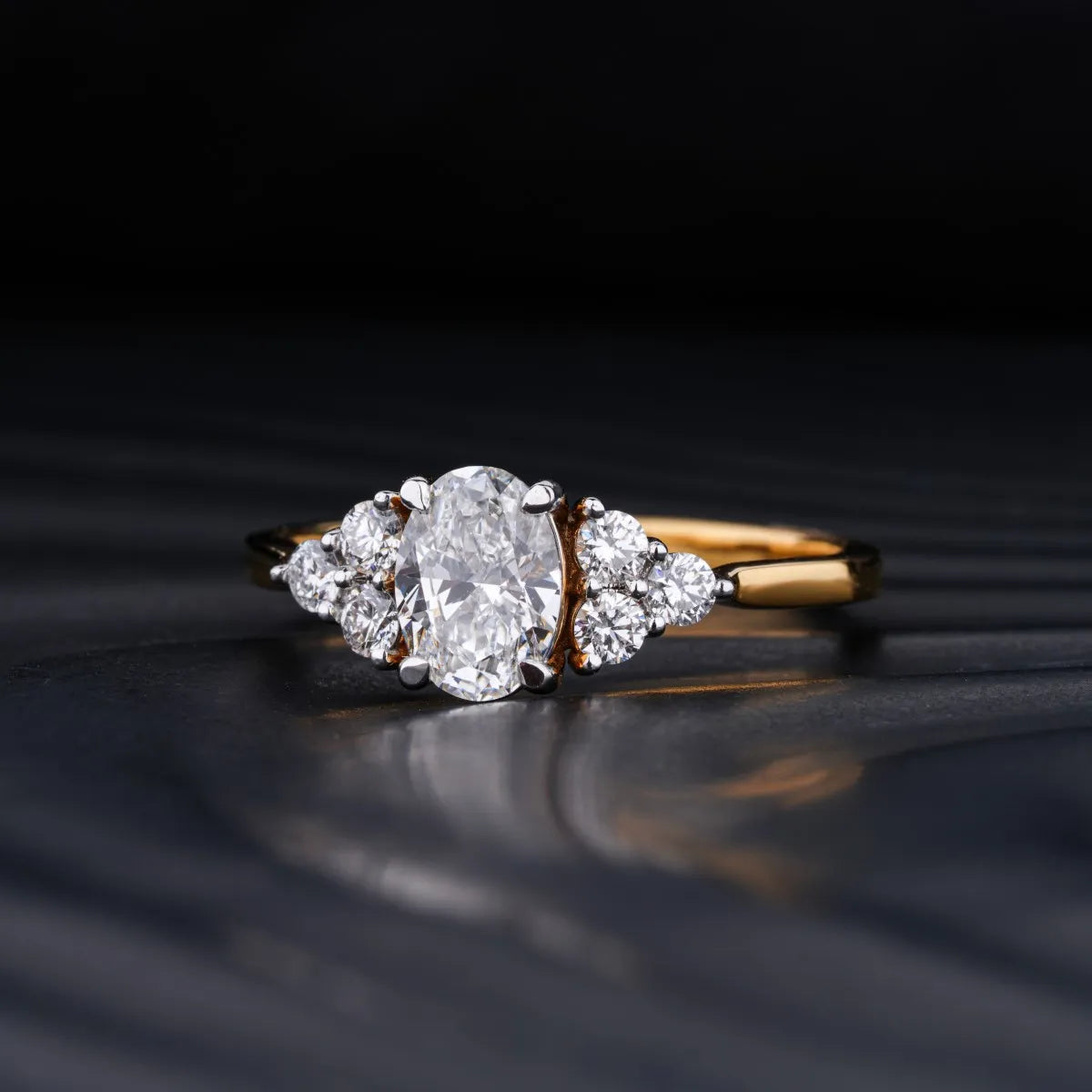 Oval Solitaire Ring With Round Accent Stones | Earthly Jewels