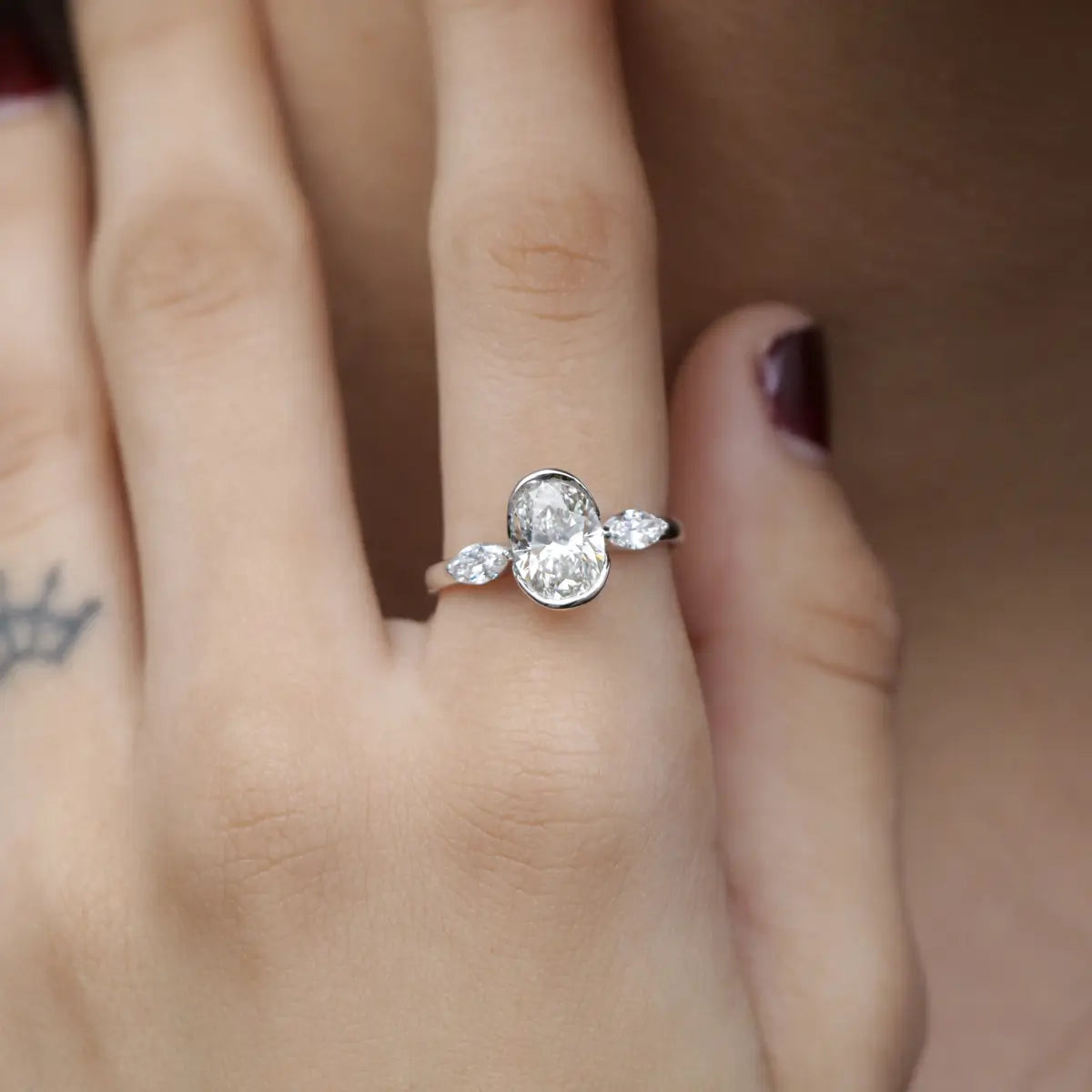 Oval Half Bezel Triple Diamond Engagement Ring