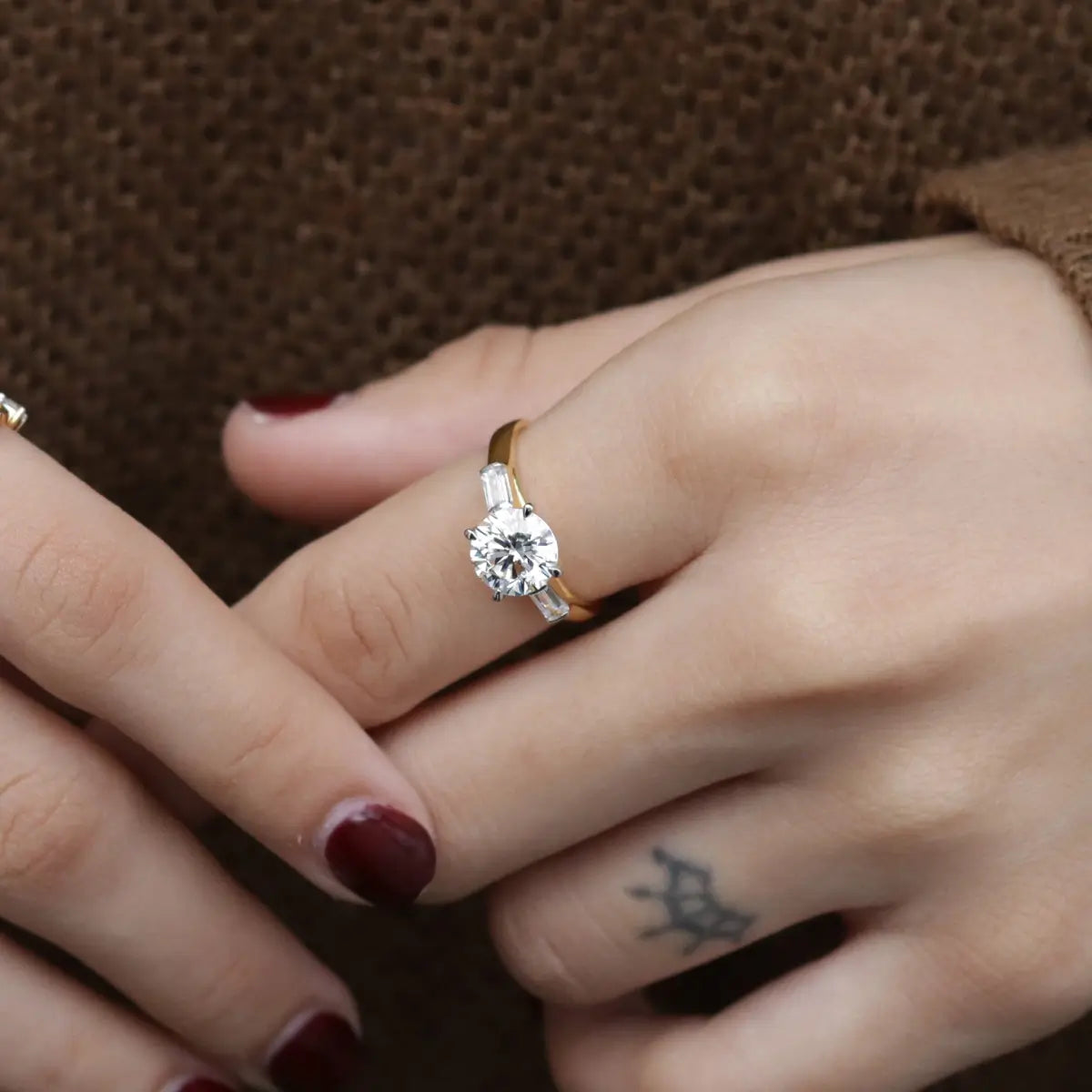 Round Solitaire Engagement Ring With Tapered Baguette