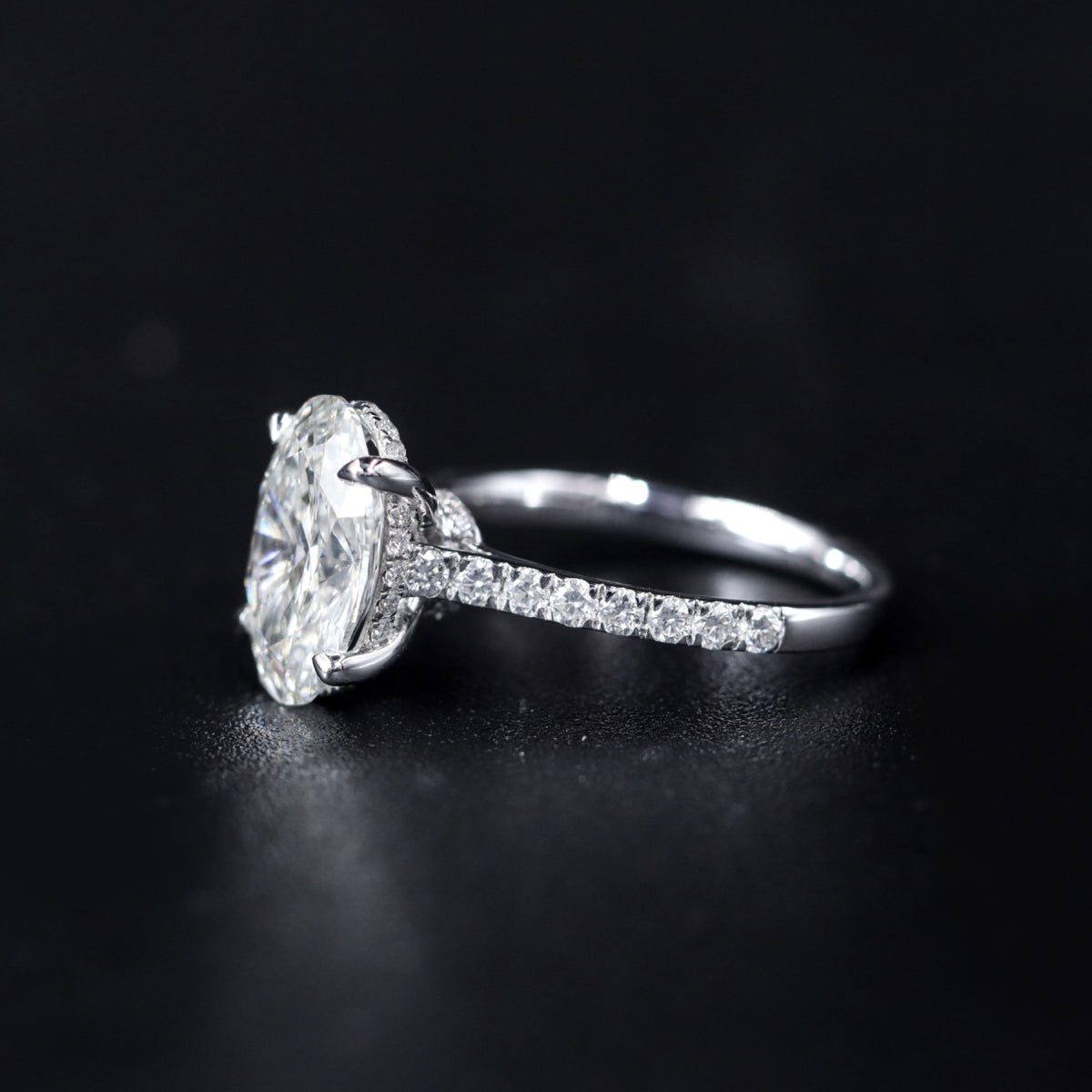 Oval Shape Solitaire With Double Hidden Halo Ring