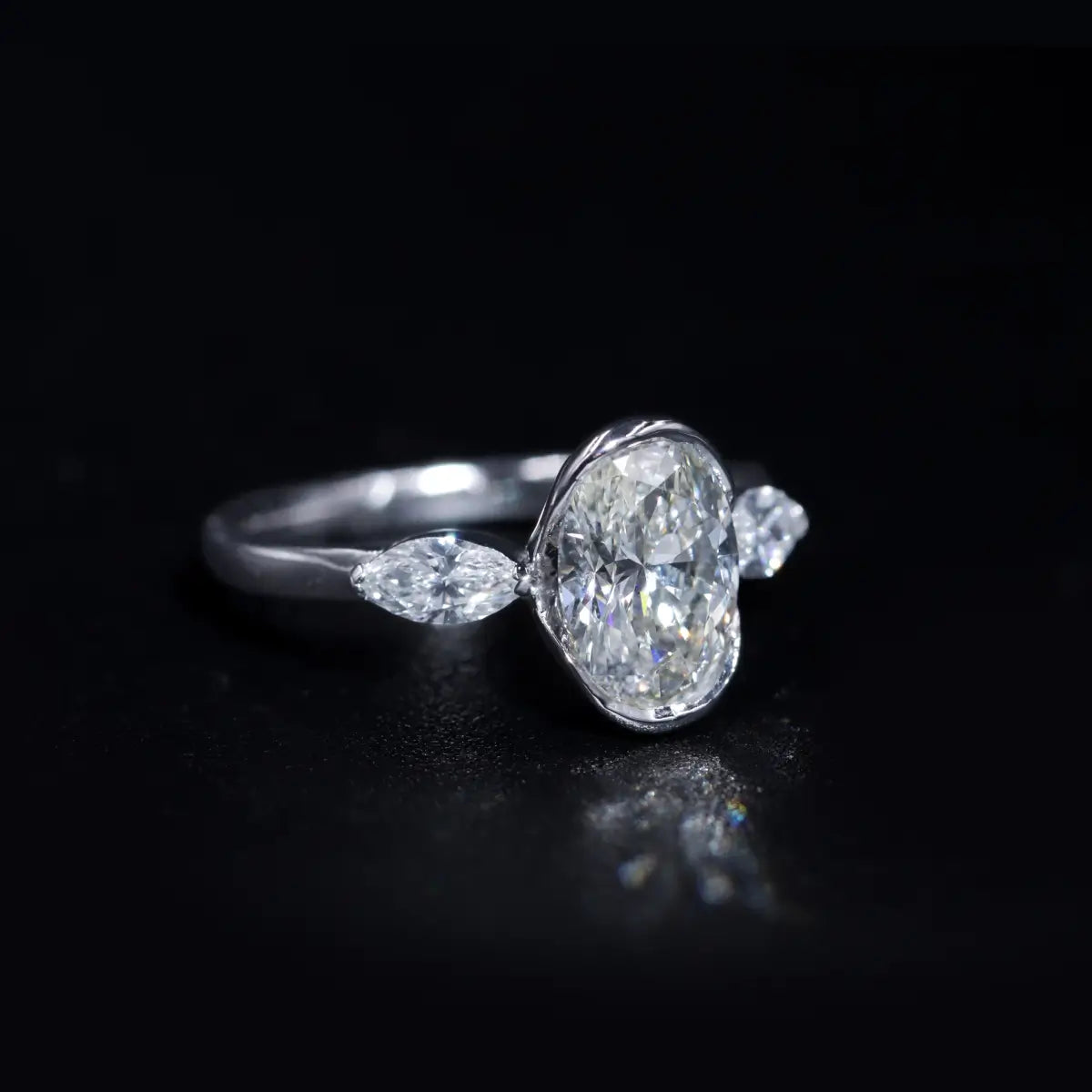 Oval Half Bezel Triple Diamond Engagement Ring