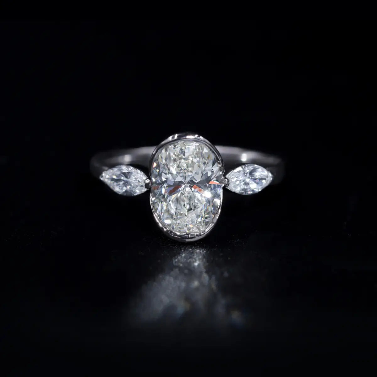 Oval Half Bezel Triple Diamond Engagement Ring